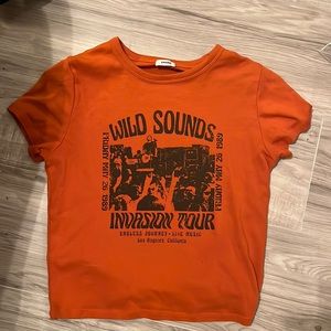 Orange graphic crop top